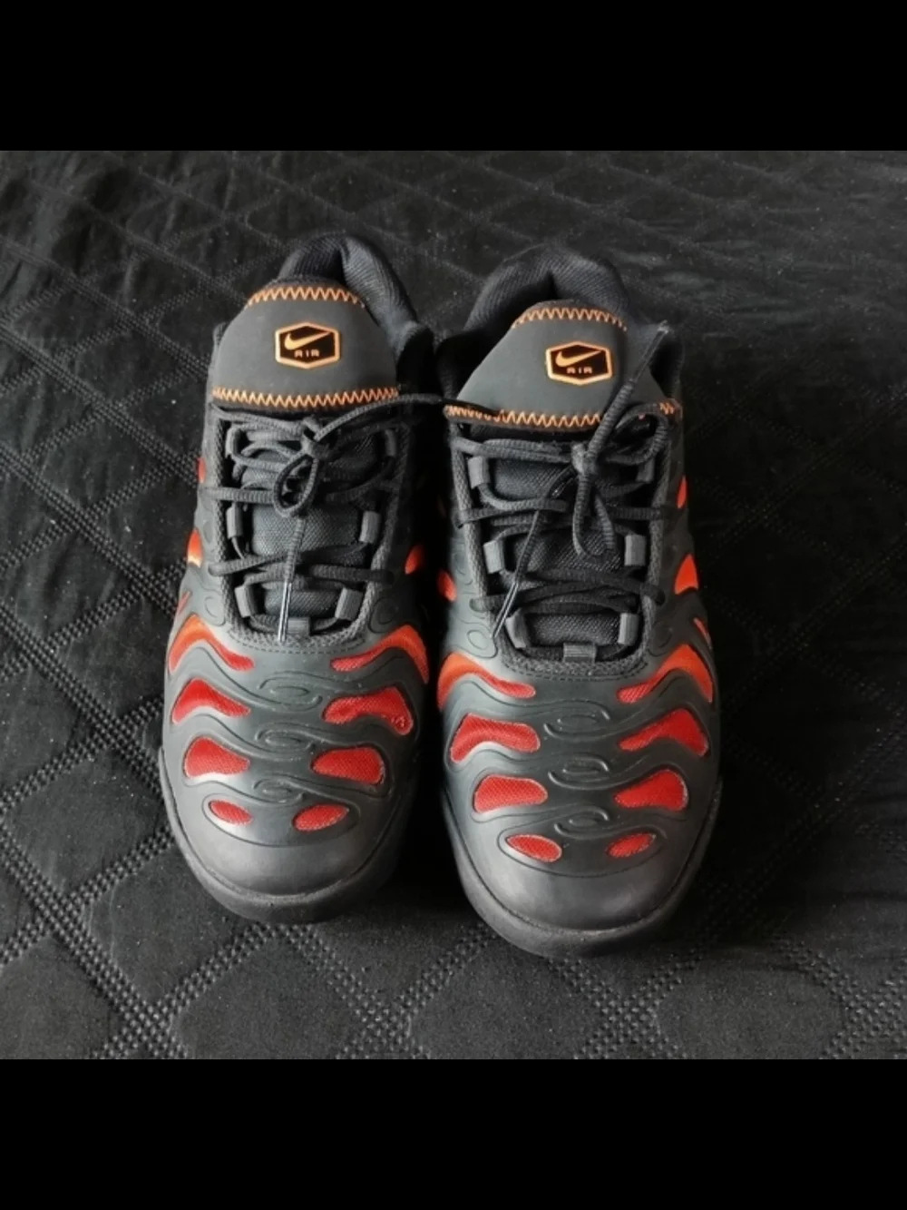 Nike Black Athletic Shoes with Black and Orange Flame Accents